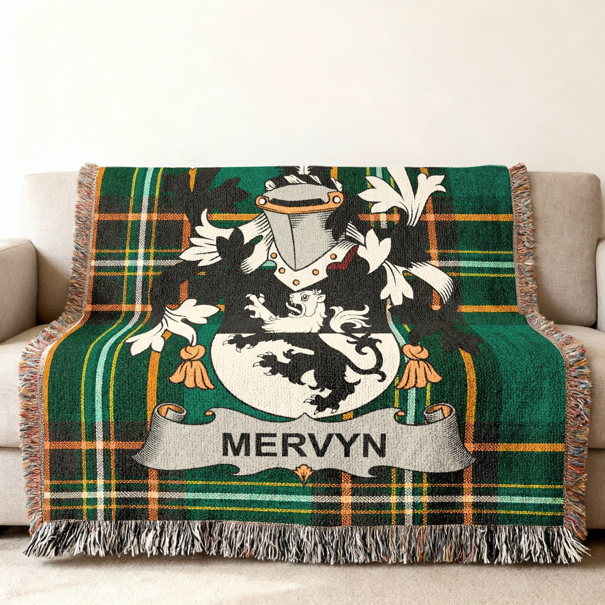 Green plaid throw blanket with Mervyn family crest.