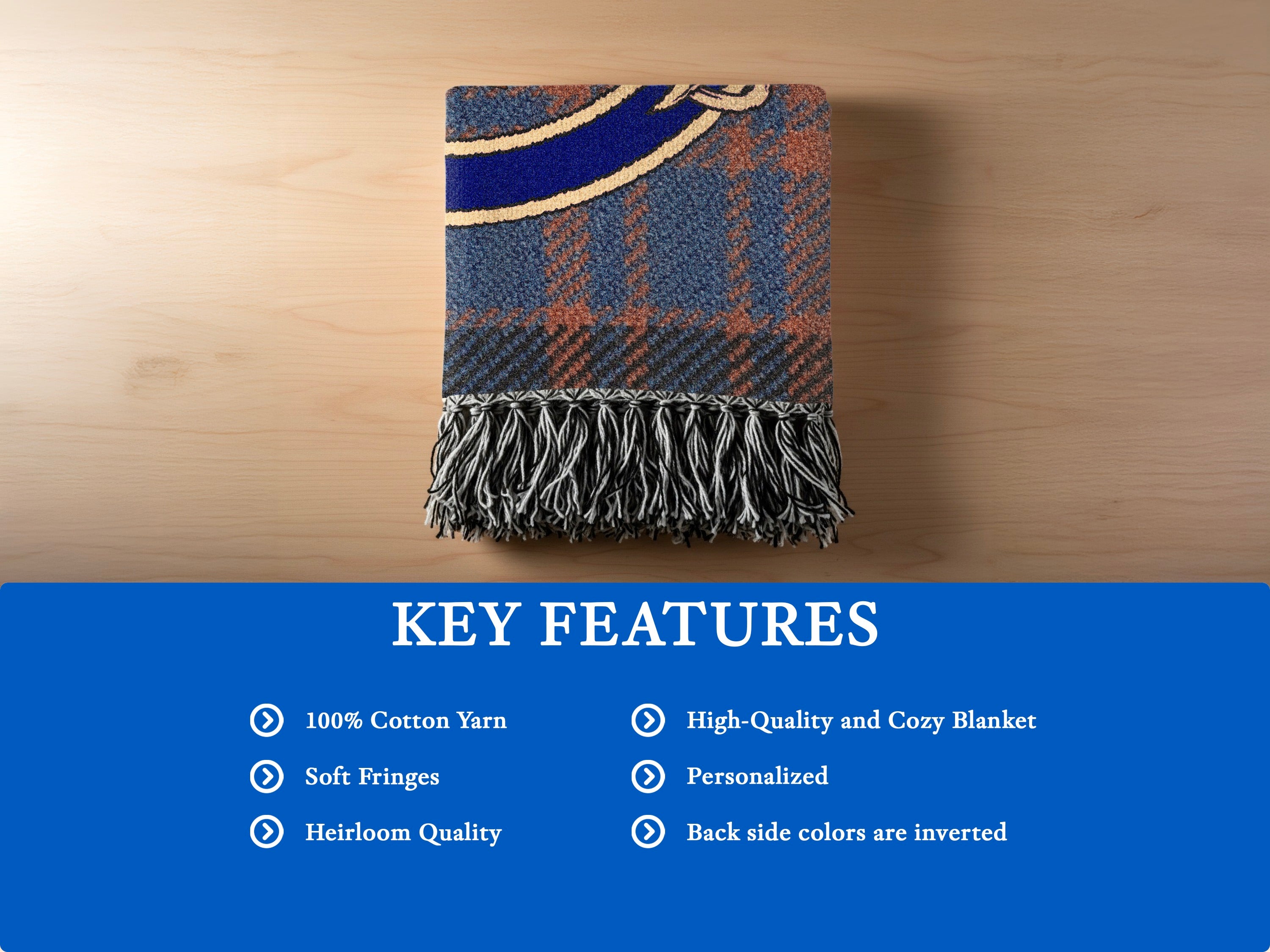 Allen woven blanket detail — tartan with fringe edges and crest design