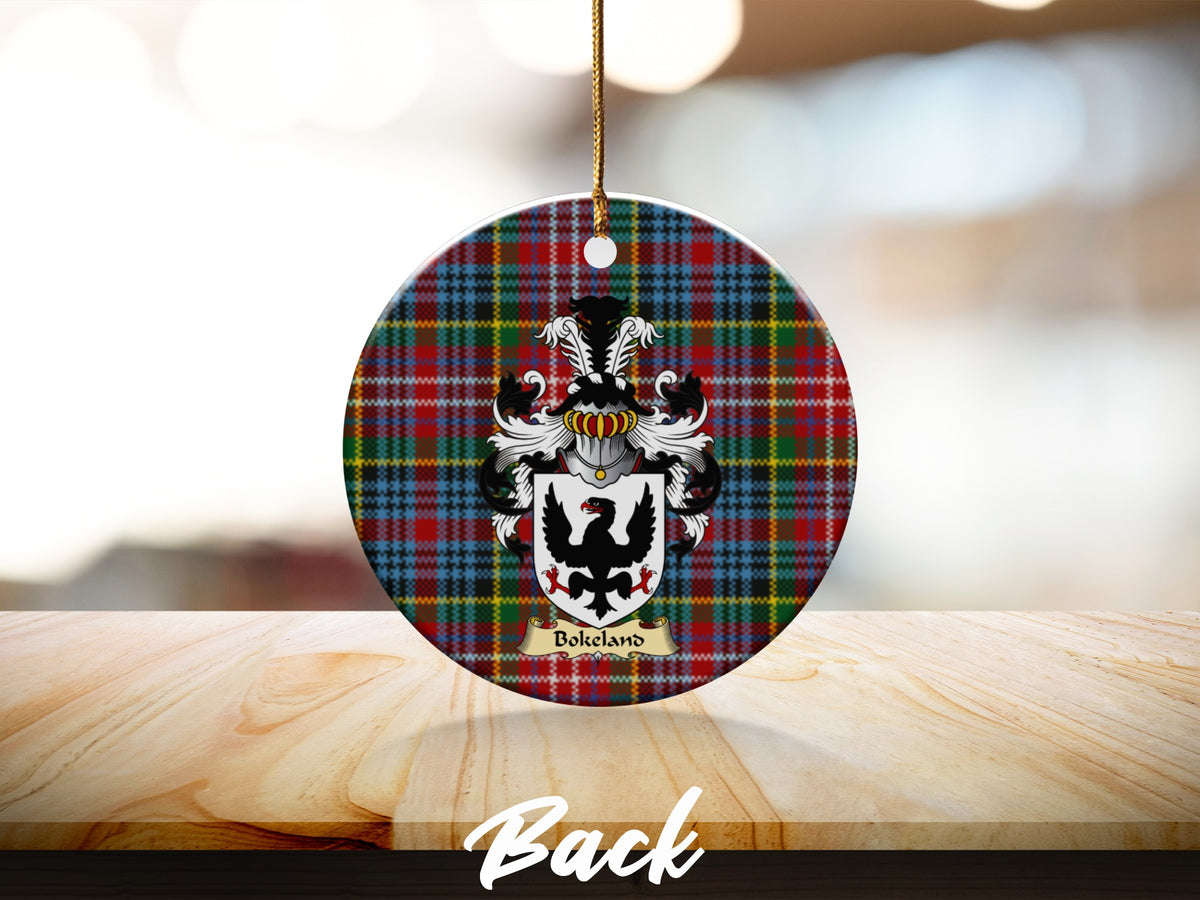 Round Bokeland Scottish clan ornament with family crest on a Caledonia tartan background