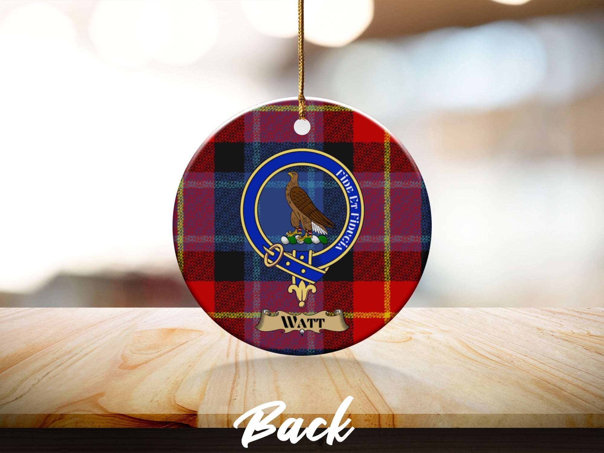 Watt clan crest with Fide et Fiducia motto on round ceramic tartan ornament