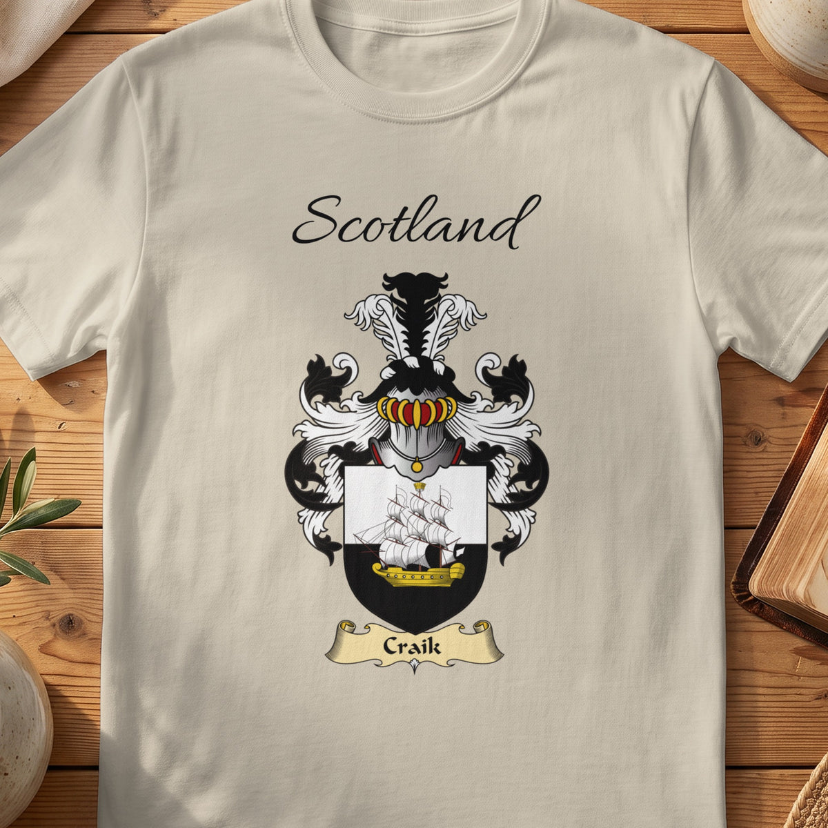 Sand Craik Scottish family shield T-shirt featuring a sailing ship on a black-and-white shield