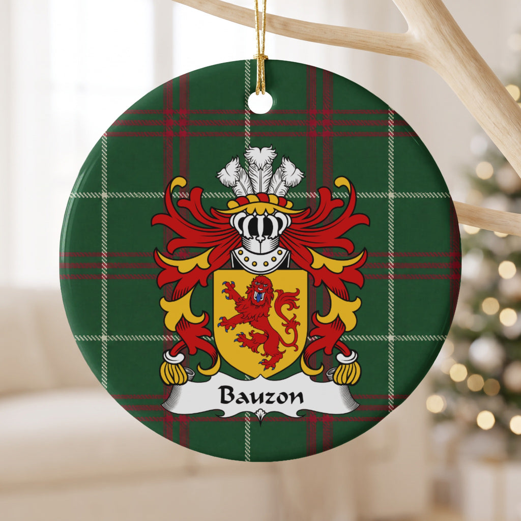 Bauzon ornament hanging from a pale wooden branch; a red upright lion facing forward on a gold shield on Welsh national tartan.