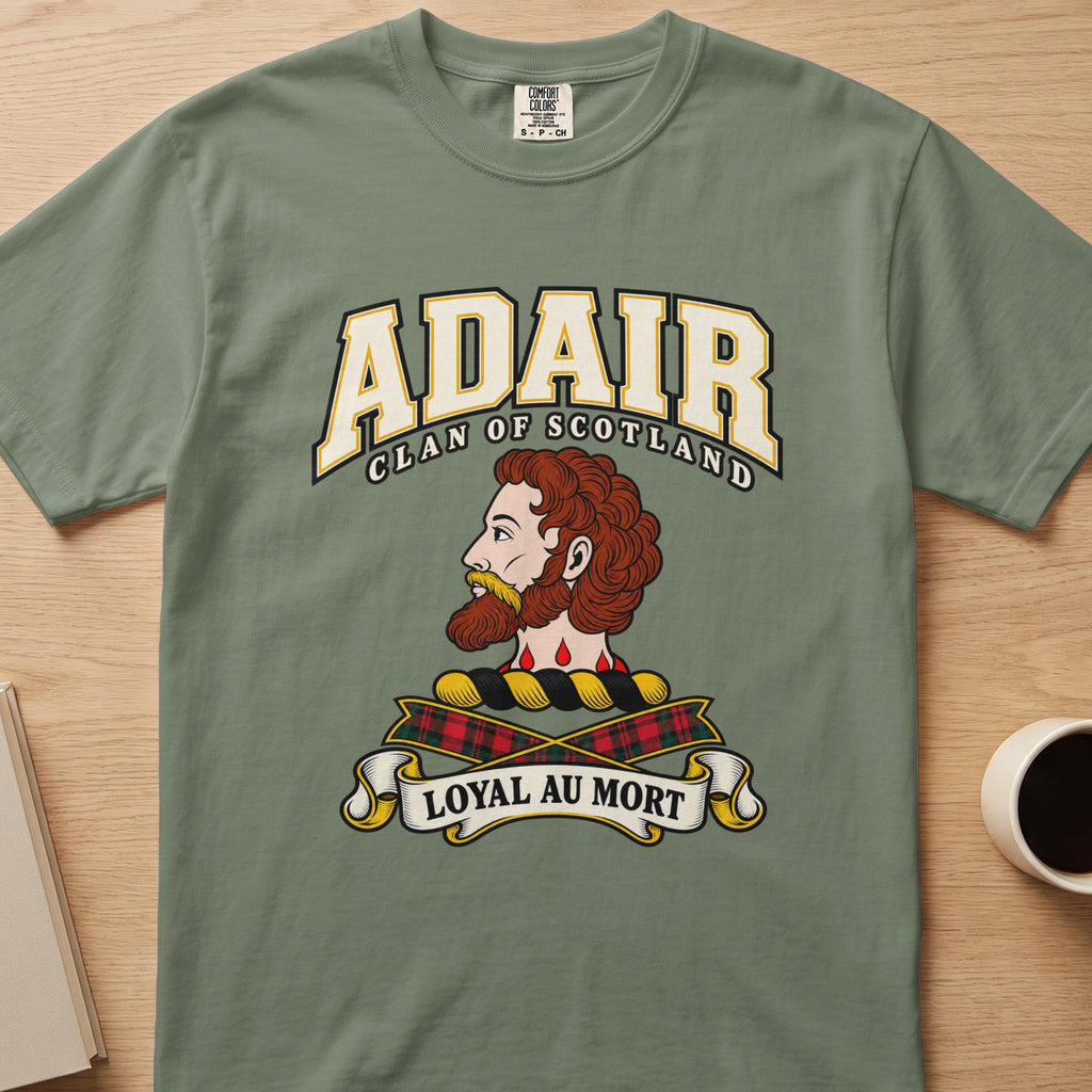 Adair bearded profile crest and tartan ribbons graphic on a sage green Comfort Colors T-shirt, front view