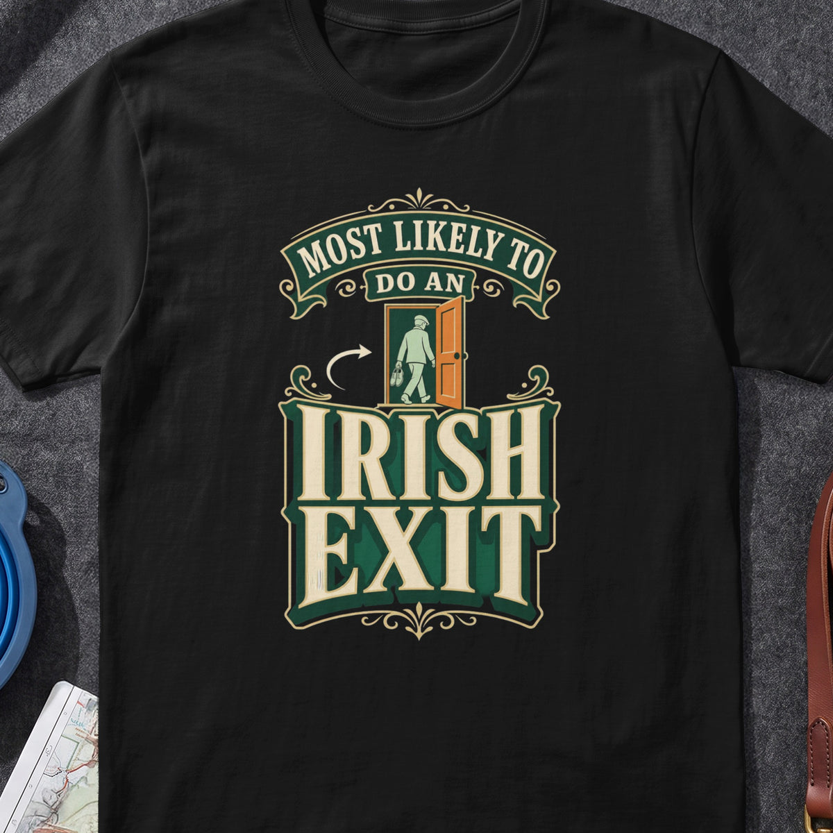 Most Likely To Do An Irish Exit Irish graphic T-shirt in Black, flat-lay mockup
