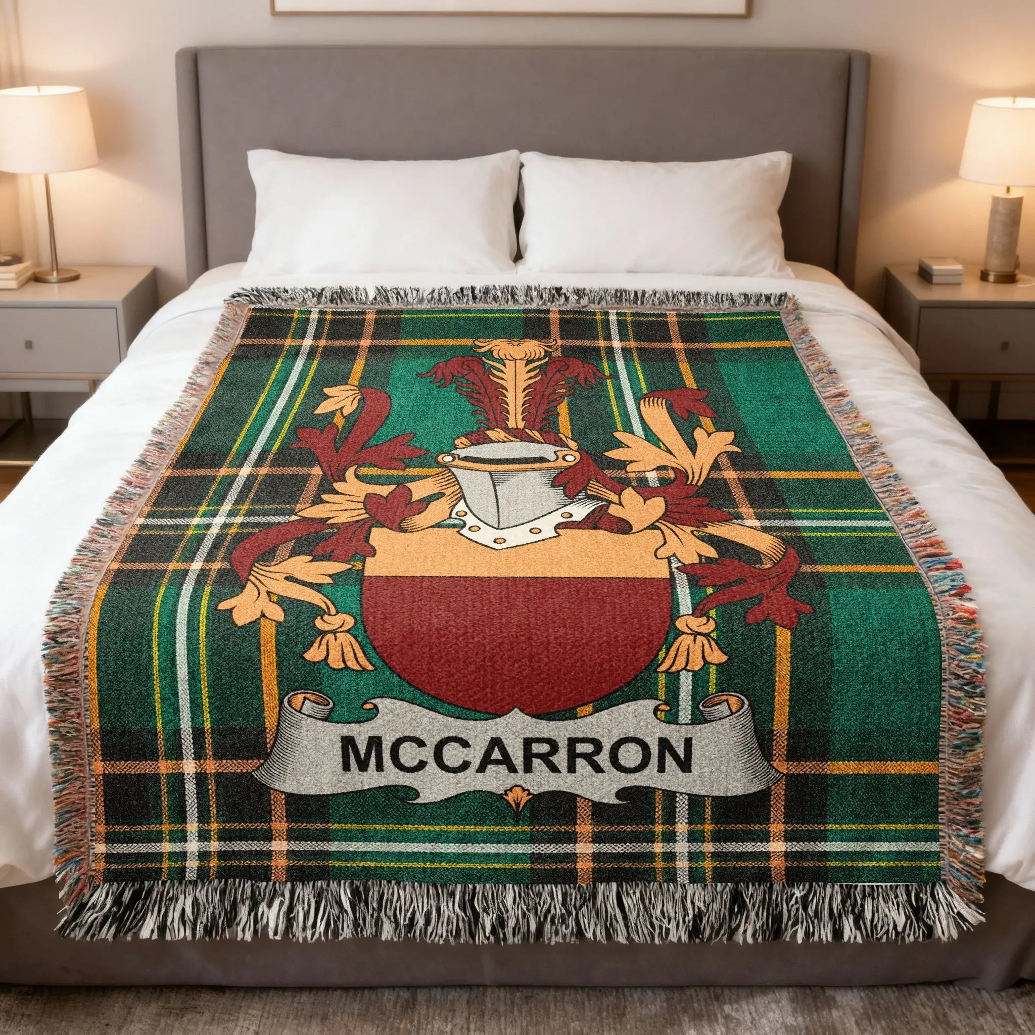 Tartan blanket with McCarron family crest and fringe.