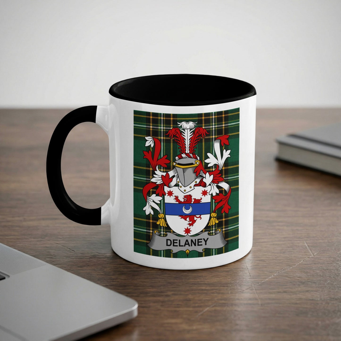 White mug with black handle displaying the Delaney family crest.