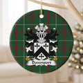 Davenport ornament hanging from a pale wooden branch; a black chevron and three black crosses on a white shield on Welsh national tartan.