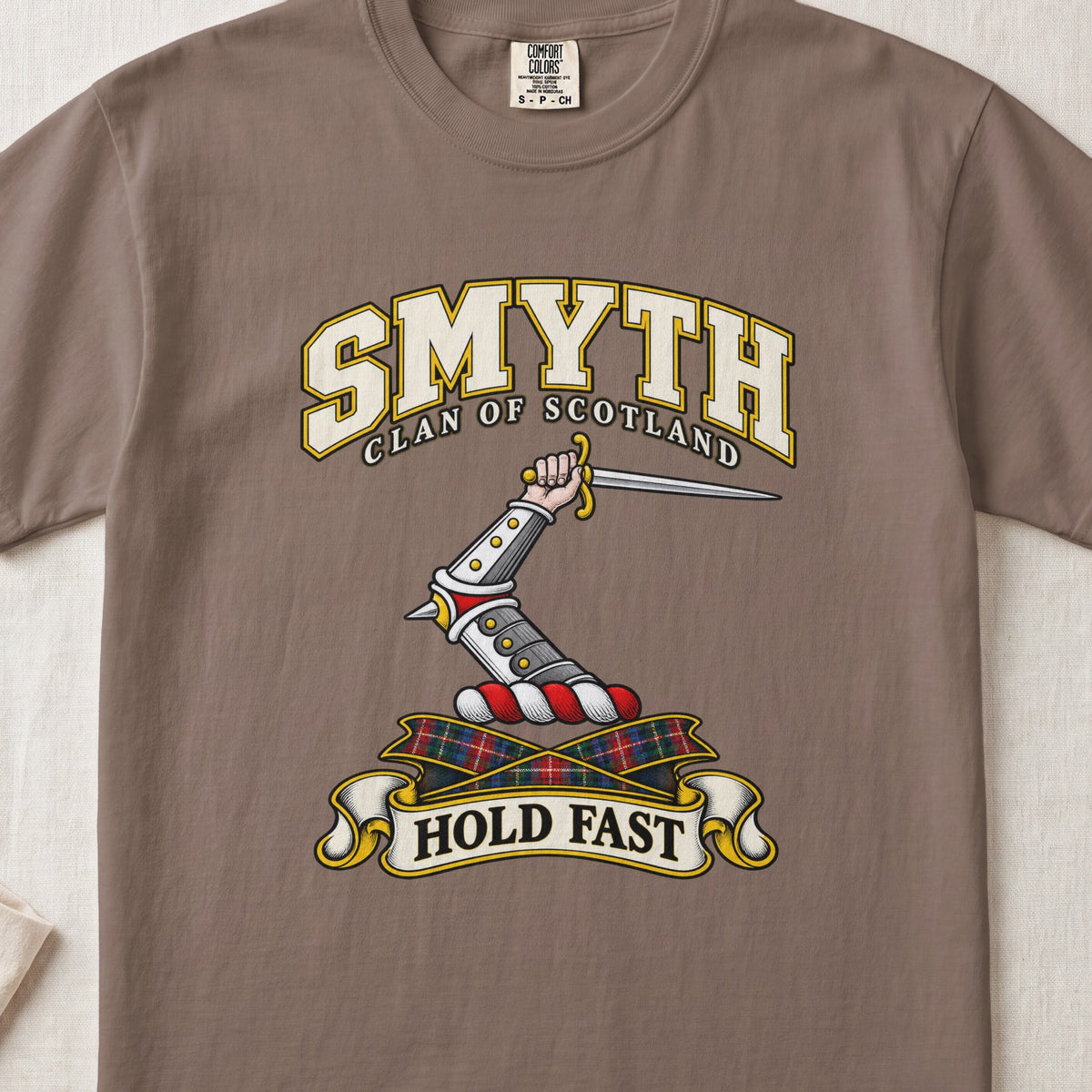 Smyth Scottish clan T-shirt in Espresso, front view with an armoured arm holding a dagger and motto design.