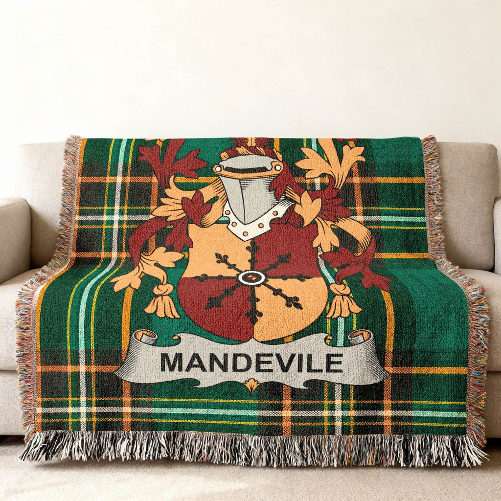 Green plaid throw blanket featuring the Mandeville family crest.
