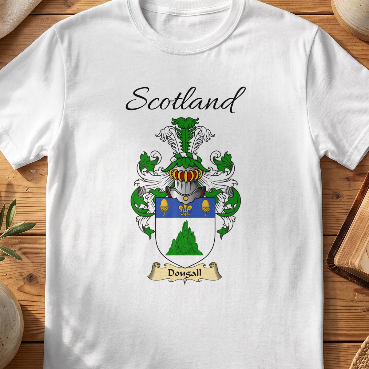 White Dougall Scottish family shield T-shirt featuring a green mound beneath a blue top band
