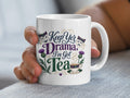 White mug with "Keep Yer Drama, I've Got Tea" text and Scottish thistle design.
