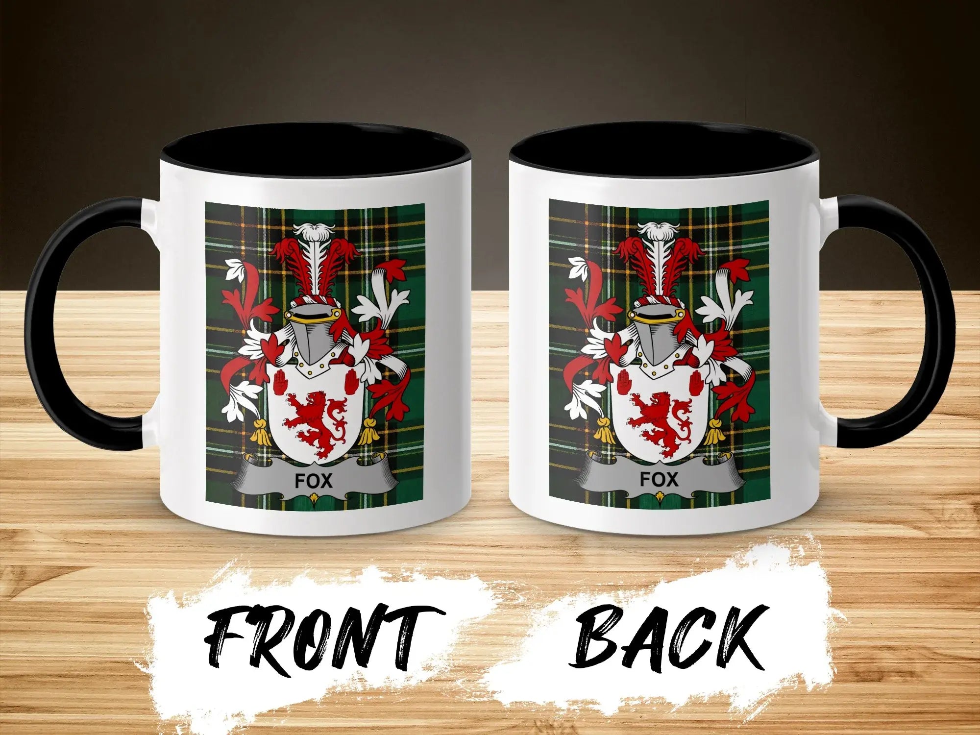 White mug with black handle displaying a red fox crest on a plaid background.