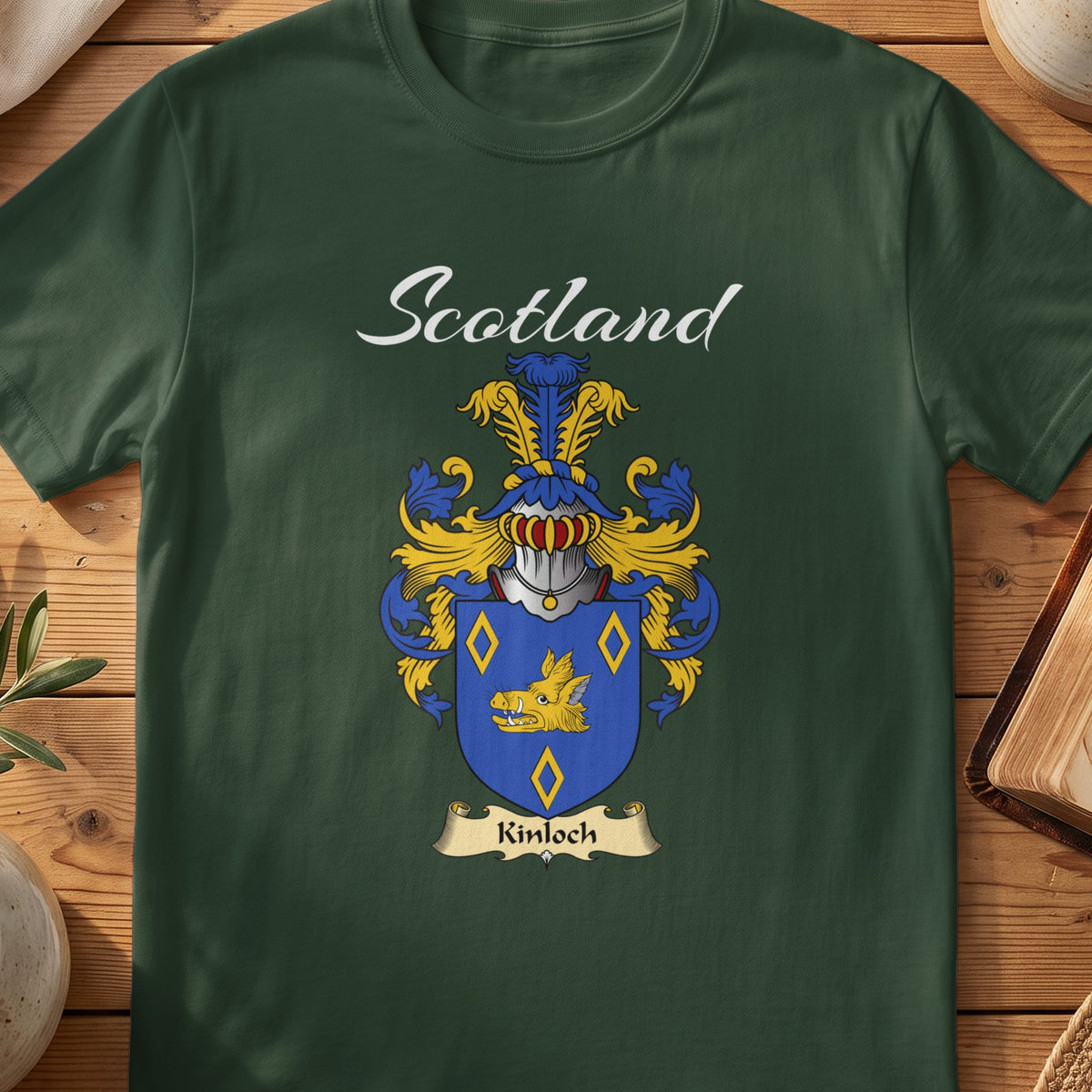 Forest Green Kinloch Scottish T-shirt featuring a blue shield with gold diamond outlines