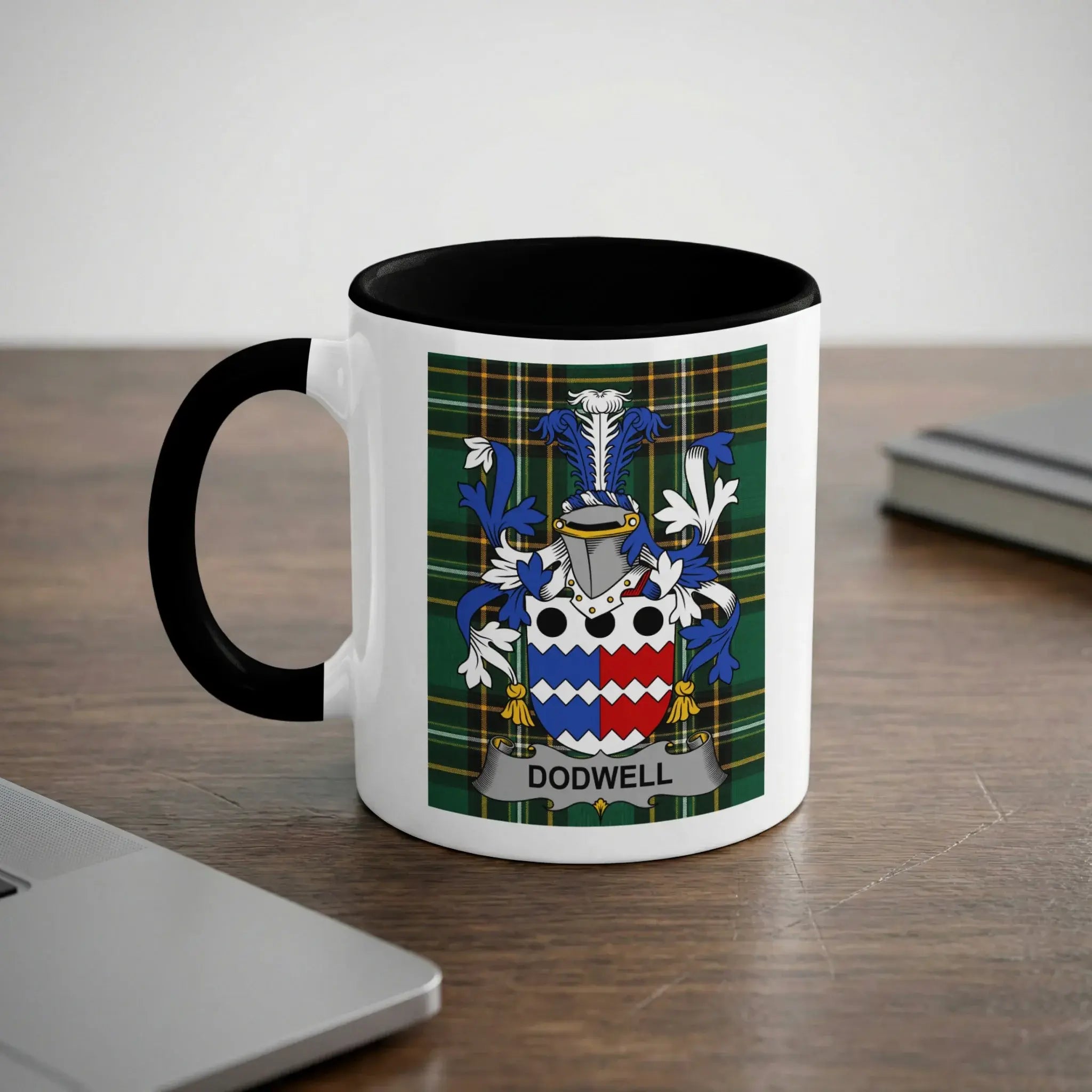 White mug with black rim featuring the Dodwell family crest.