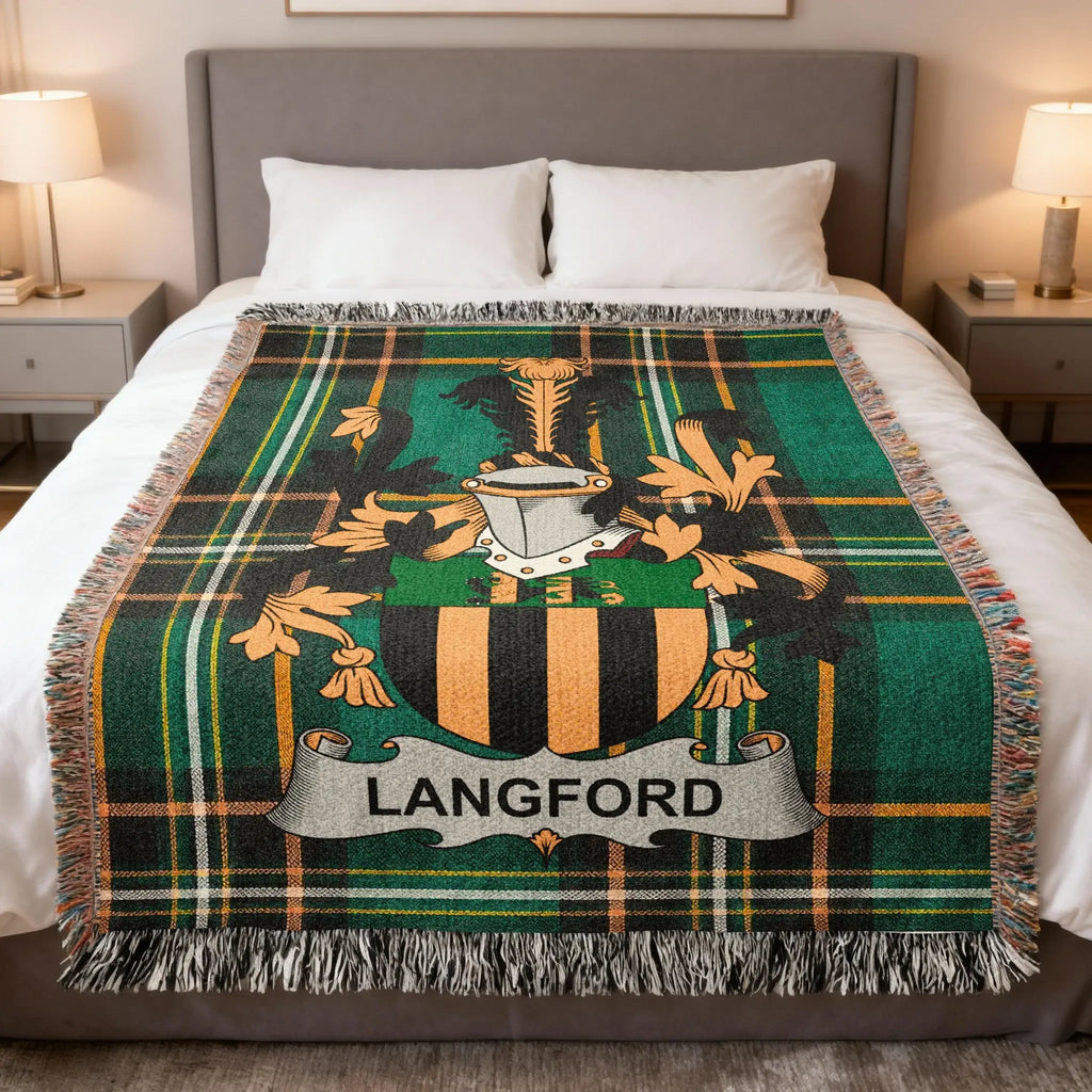 Plaid throw blanket with Langford family crest on a bed.
