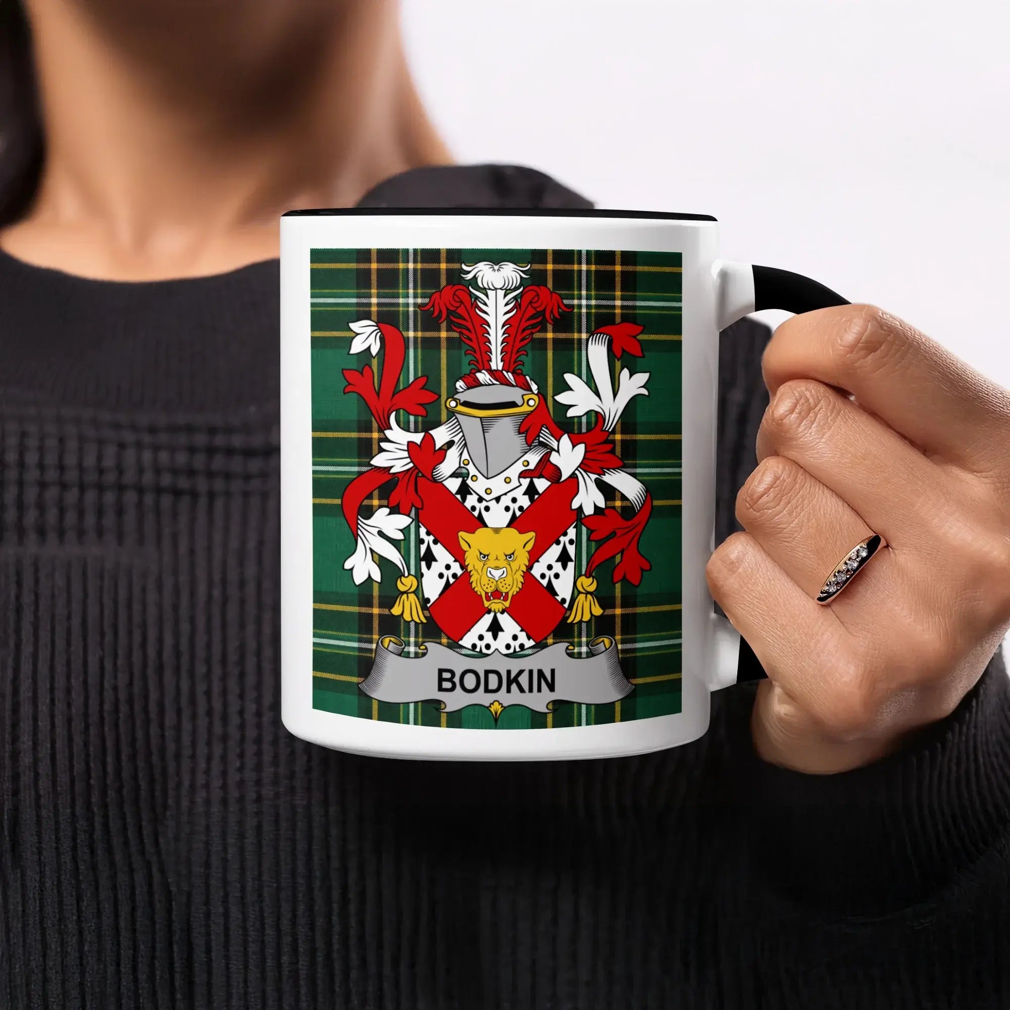 White mug with black rim features a green tartan pattern and the "BODKIN" family crest.
