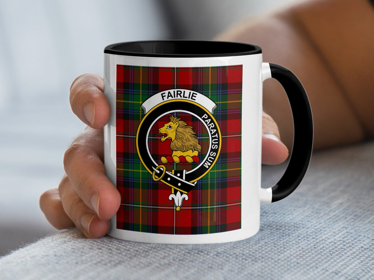 Fairlie Scottish family crest artwork on an 11 oz black accent mug with a tartan background