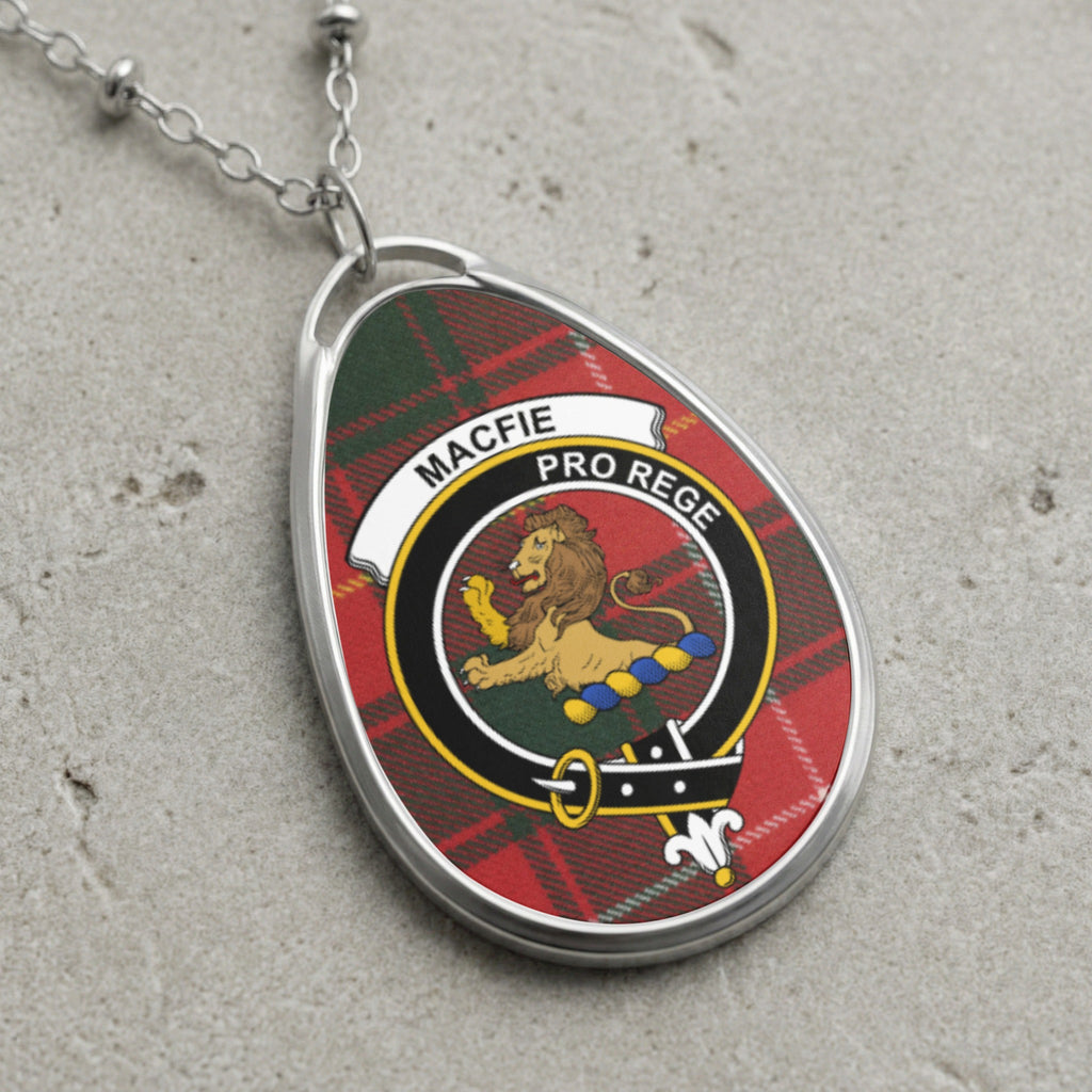 Macfie clan crest oval pendant necklace with tartan background and lion detail.
