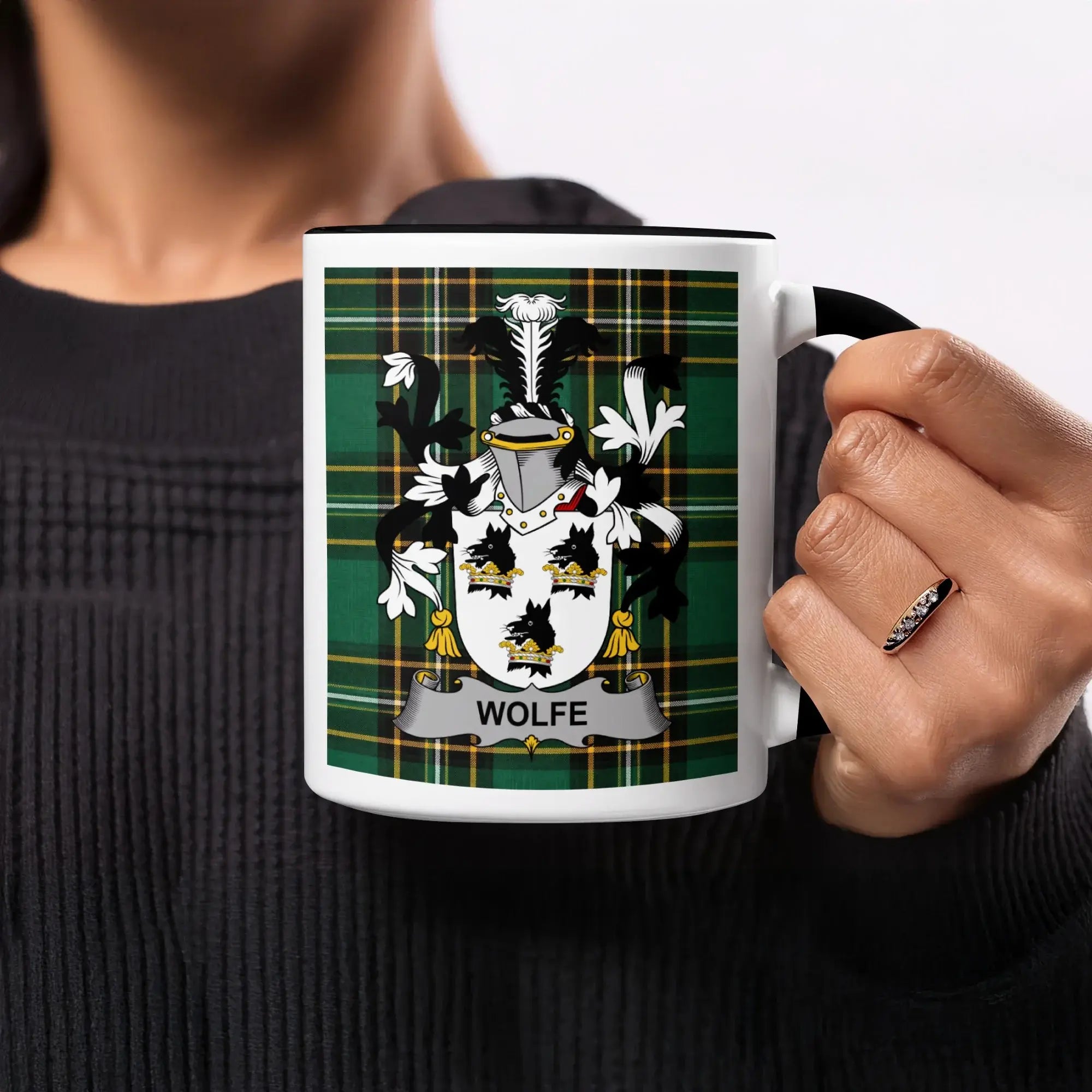 Mug featuring a green plaid background and the "Wolfe" surname coat of arms.