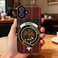 Clan Munro Dread God eagle crest tartan phone case — glossy full-wrap print on iPhone
