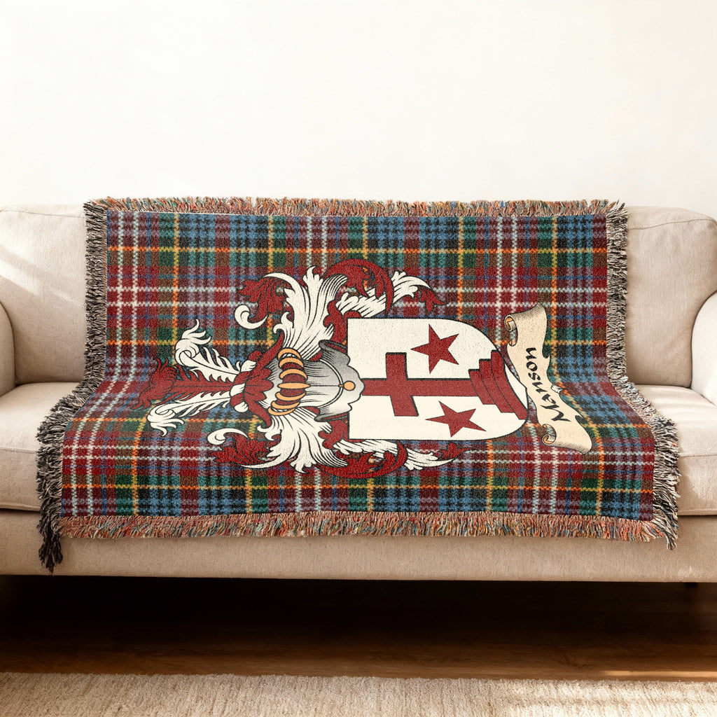 Manson Scottish woven blanket with family shield and Caledonia tartan background