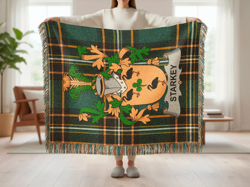 Tartan blanket with Starkey surname crest featuring a shamrock and helmet.