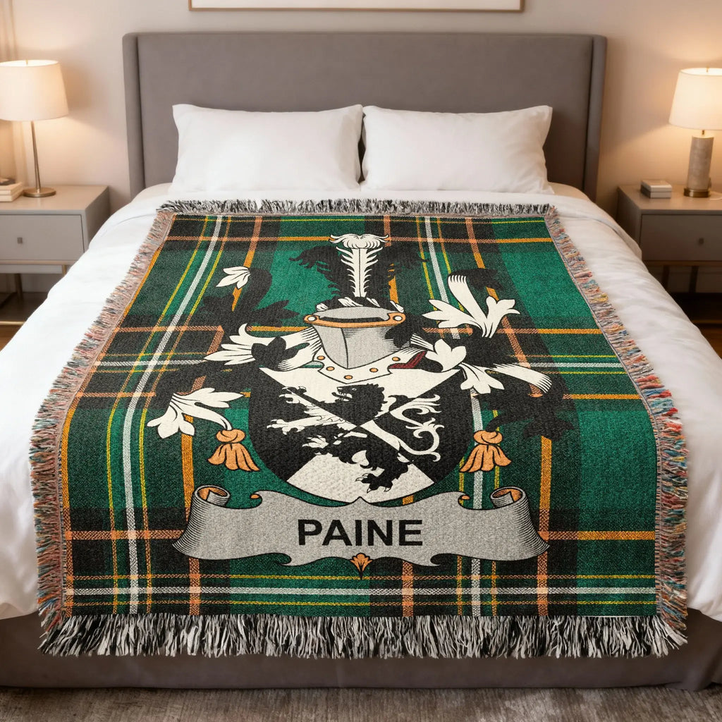 Tartan blanket with the Paine family crest in the center.