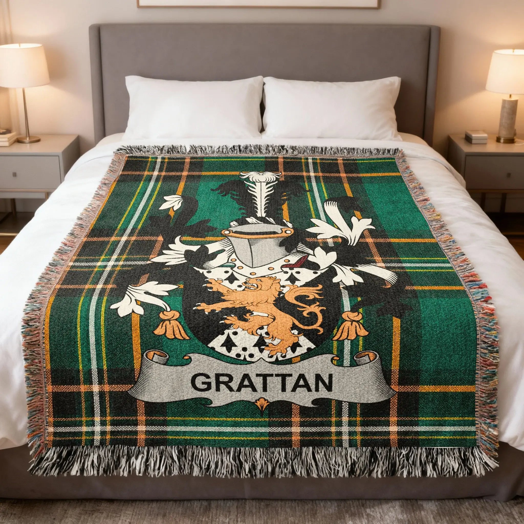 Green tartan blanket with the Grattan family crest.