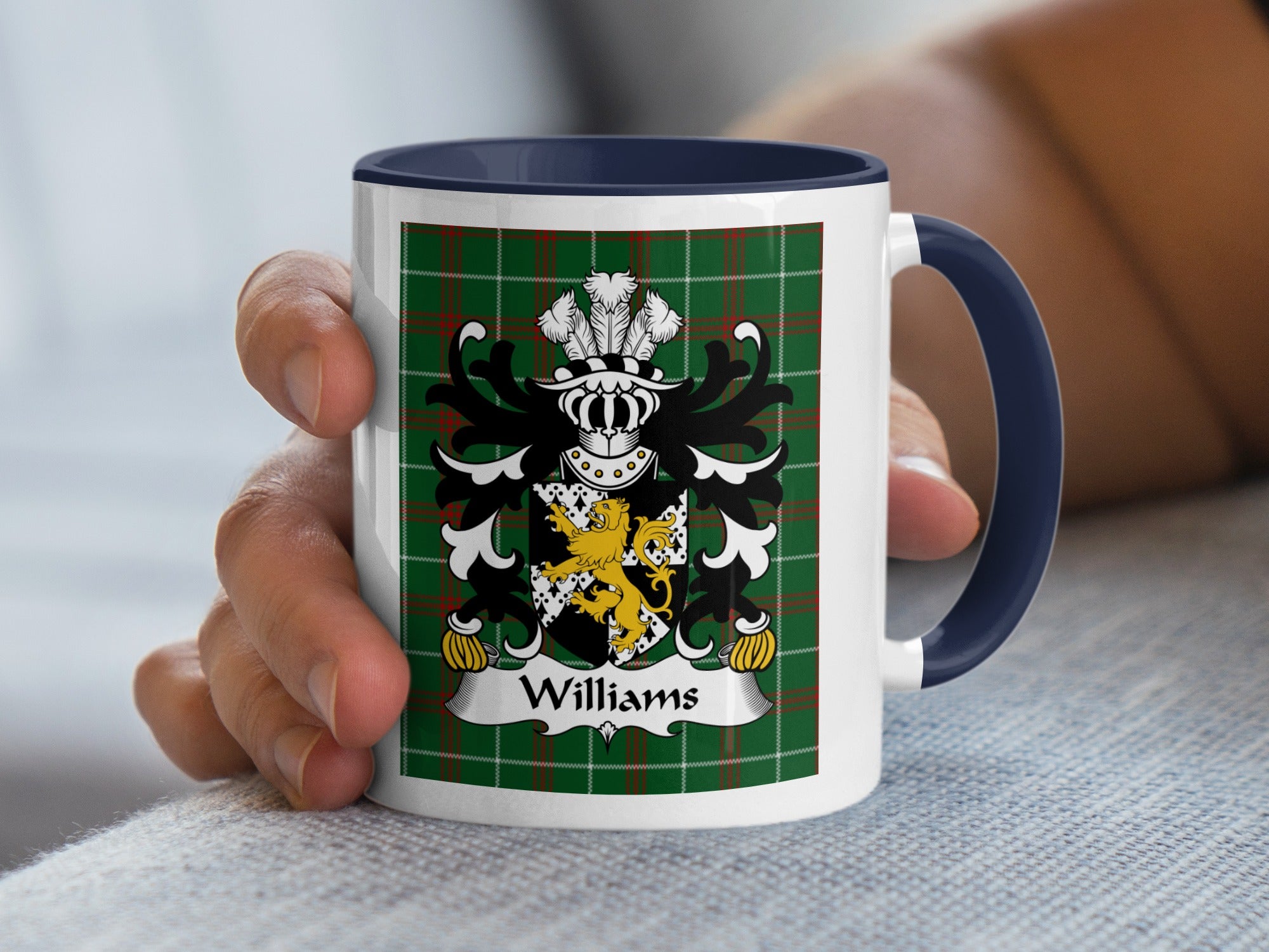 Mug with a family crest and the name "Williams" on a tartan background.