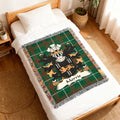 Green tartan woven blanket with the Morris family crest and name.