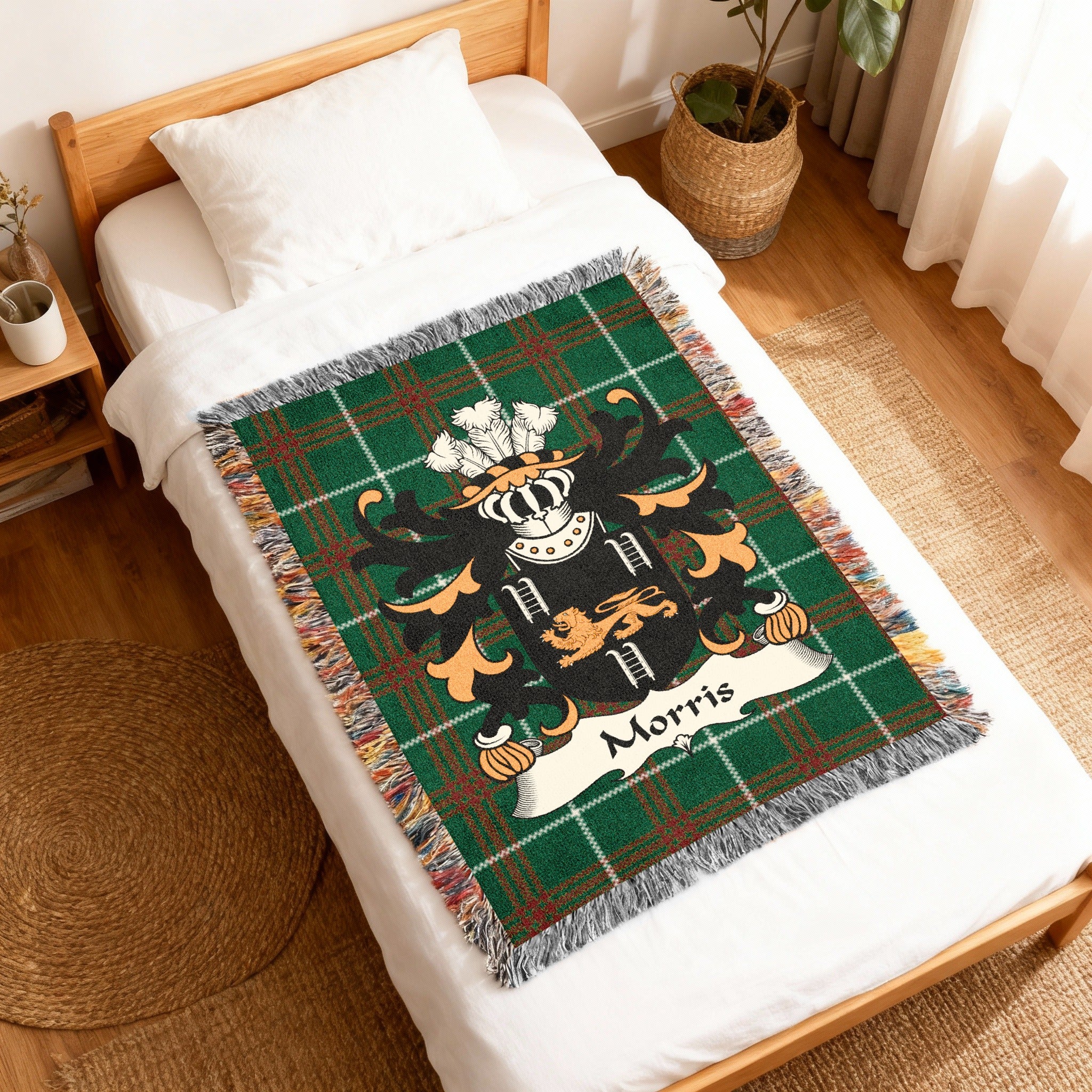 Green tartan woven blanket with the Morris family crest and name.