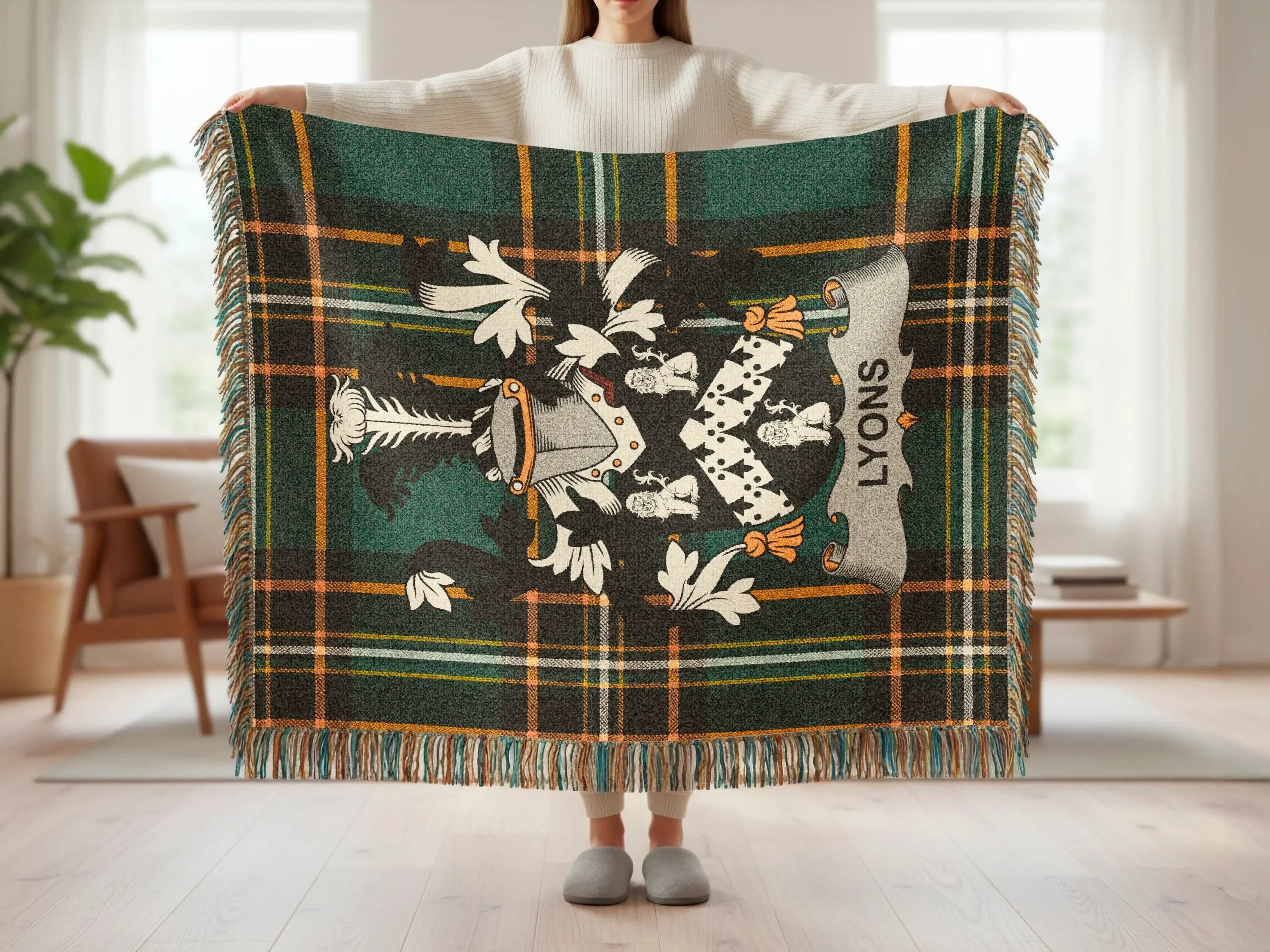 Tartan blanket with coat of arms and "LYONS" banner held by person.