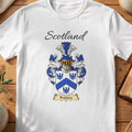 White Frances Scottish family shield T-shirt featuring blue birds around a blue chevron