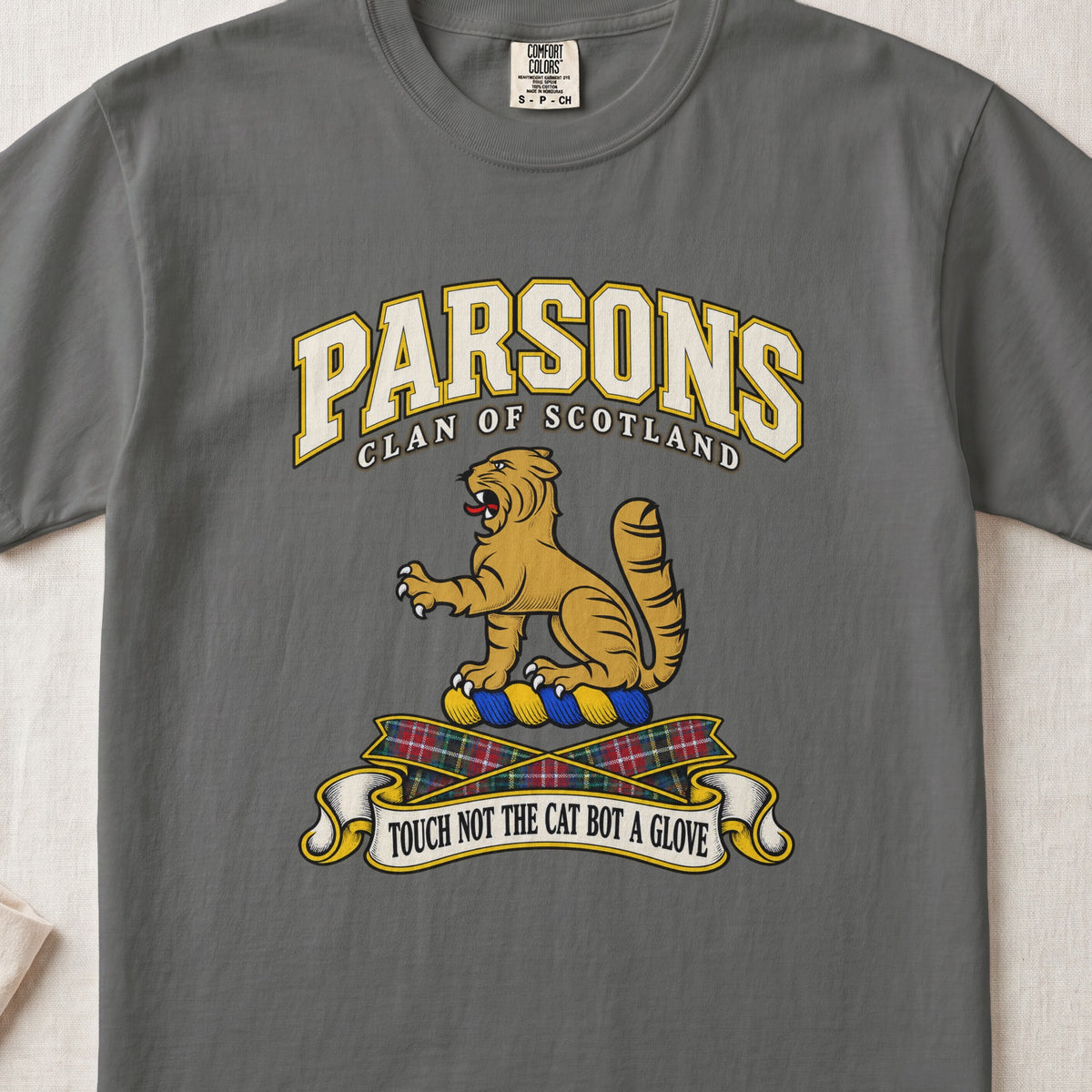 Parsons Scottish clan T-shirt in Pepper, front view with a golden wildcat and motto design.