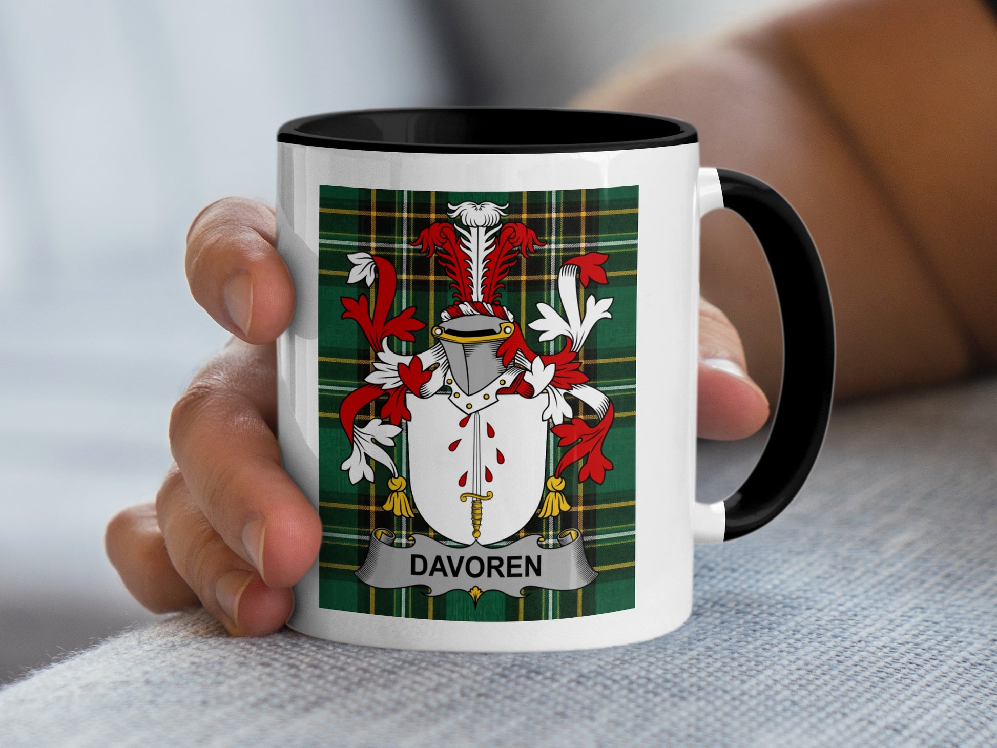 White mug with black handle and plaid design featuring Davoren coat of arms.