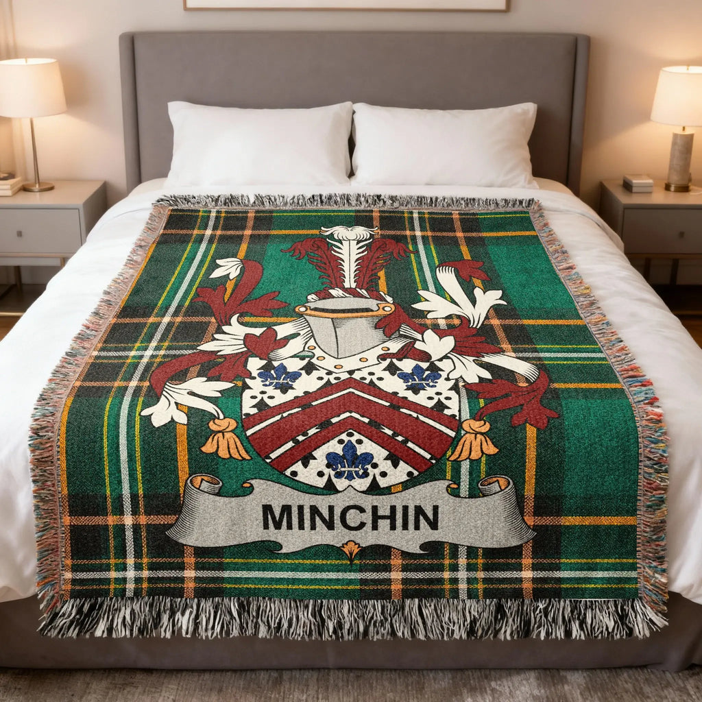 Tartan blanket with the MINCHIN family crest displayed prominently.