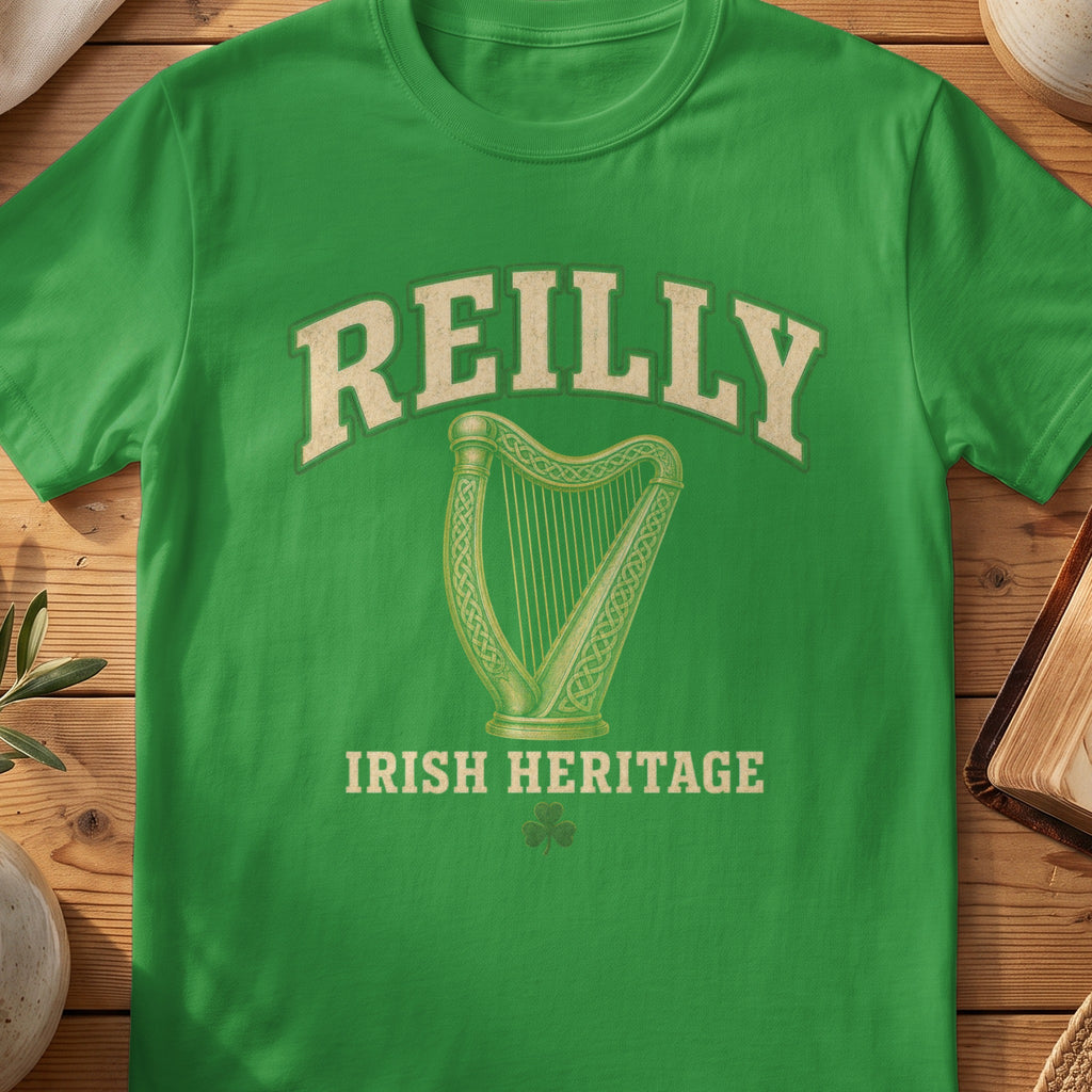 Reilly Irish harp T-shirt in Irish Green, with cream surname lettering, a gold-toned harp, green shamrock and “Irish Heritage” text.