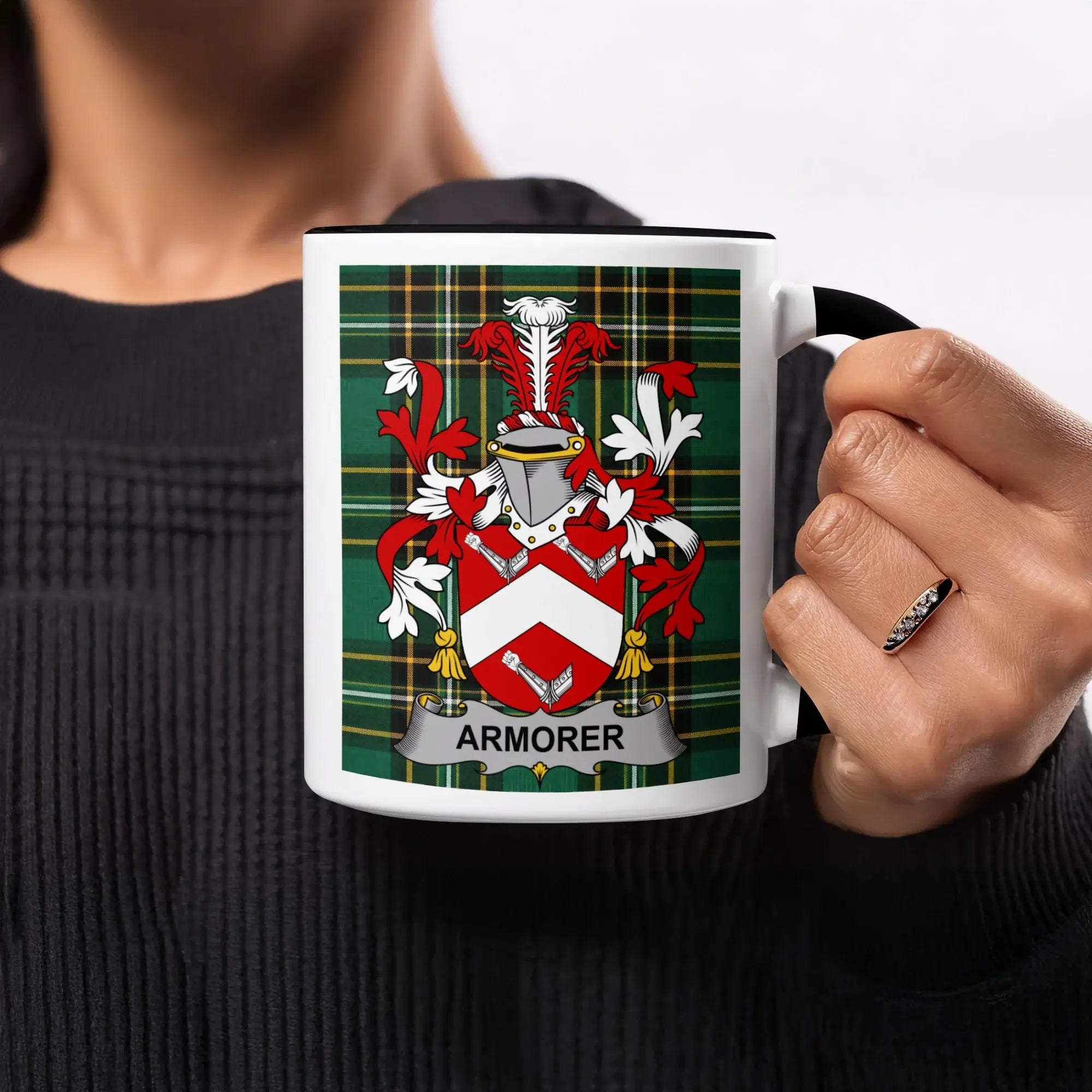 White mug with black handle displaying a coat of arms with "ARMORER" text.
