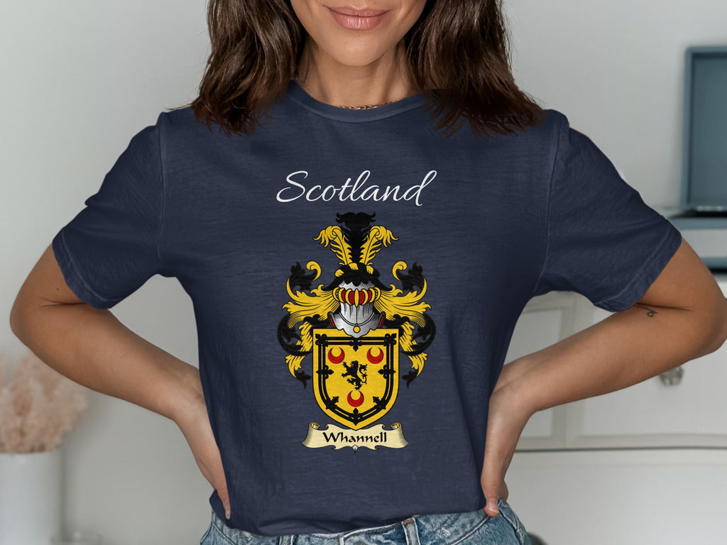 Model wearing the navy Whannell family crest T-shirt featuring “Scotland” and the surname banner.