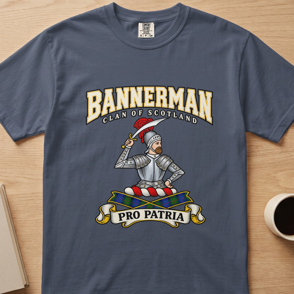 Bannerman armored figure and raised sword graphic on a slate blue Comfort Colors T-shirt, front view