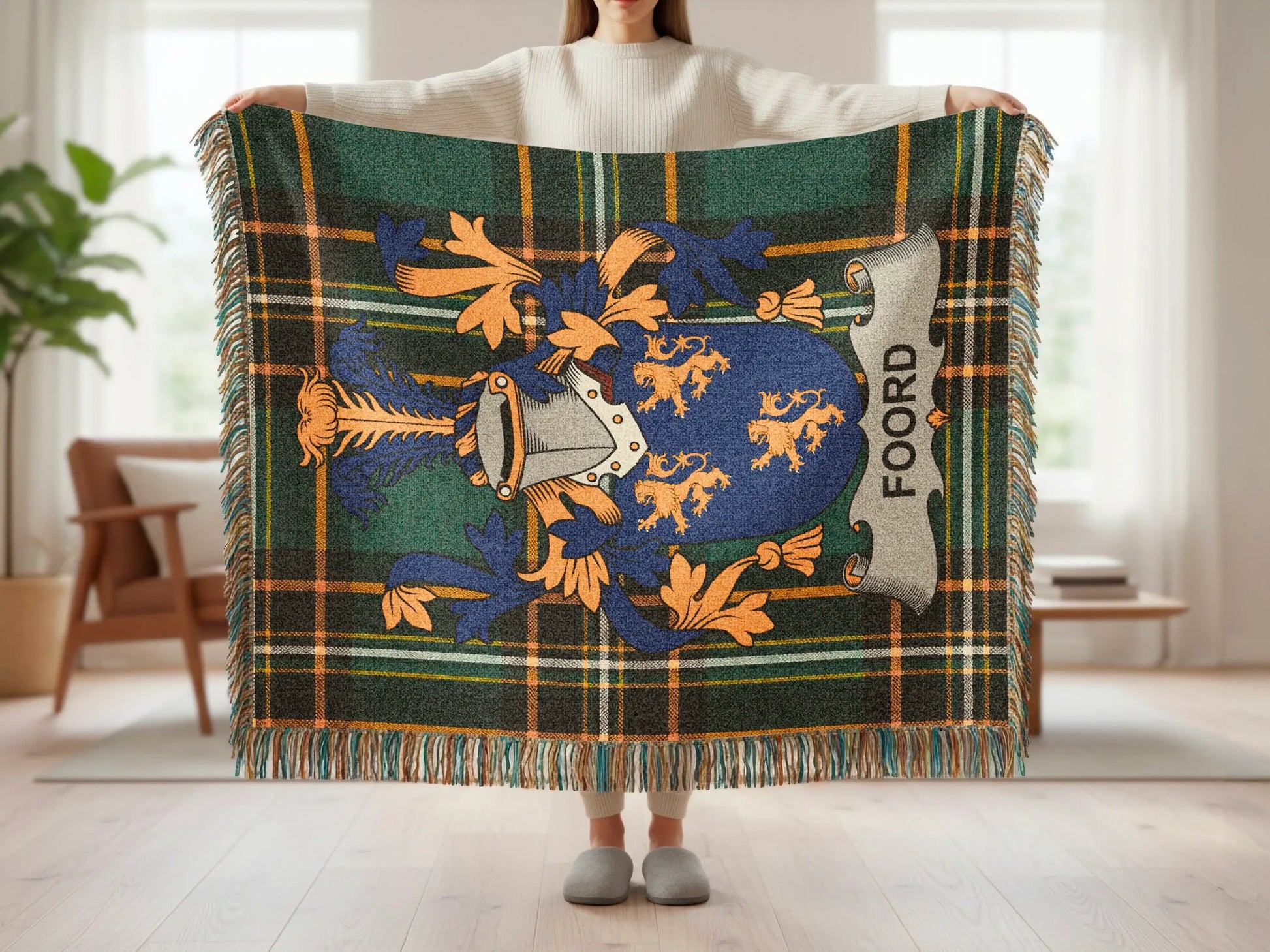 Plaid blanket with blue and gold crest featuring "FOORD" text.