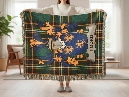 Plaid blanket with blue and gold crest featuring "FOORD" text.