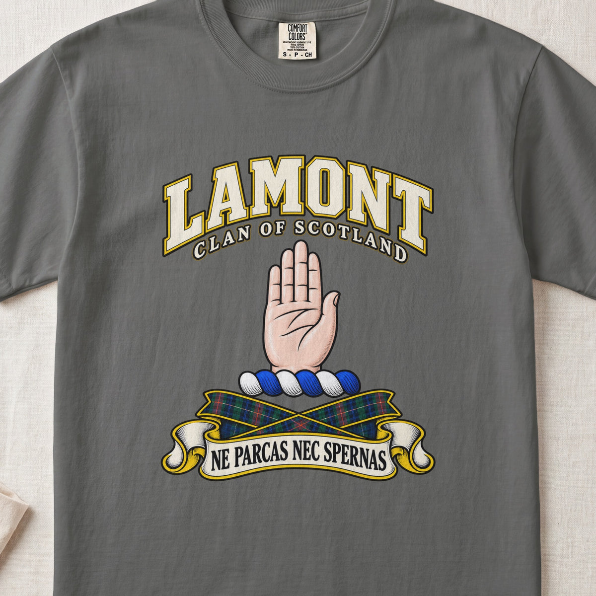 Lamont Scottish clan T-shirt in Pepper, front view with a raised open hand and motto banner.