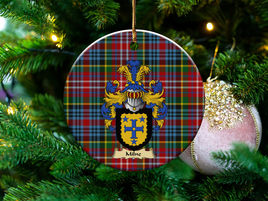 Milne Scottish clan ceramic ornament with family crest on a Caledonia tartan background, hanging on a Christmas tree