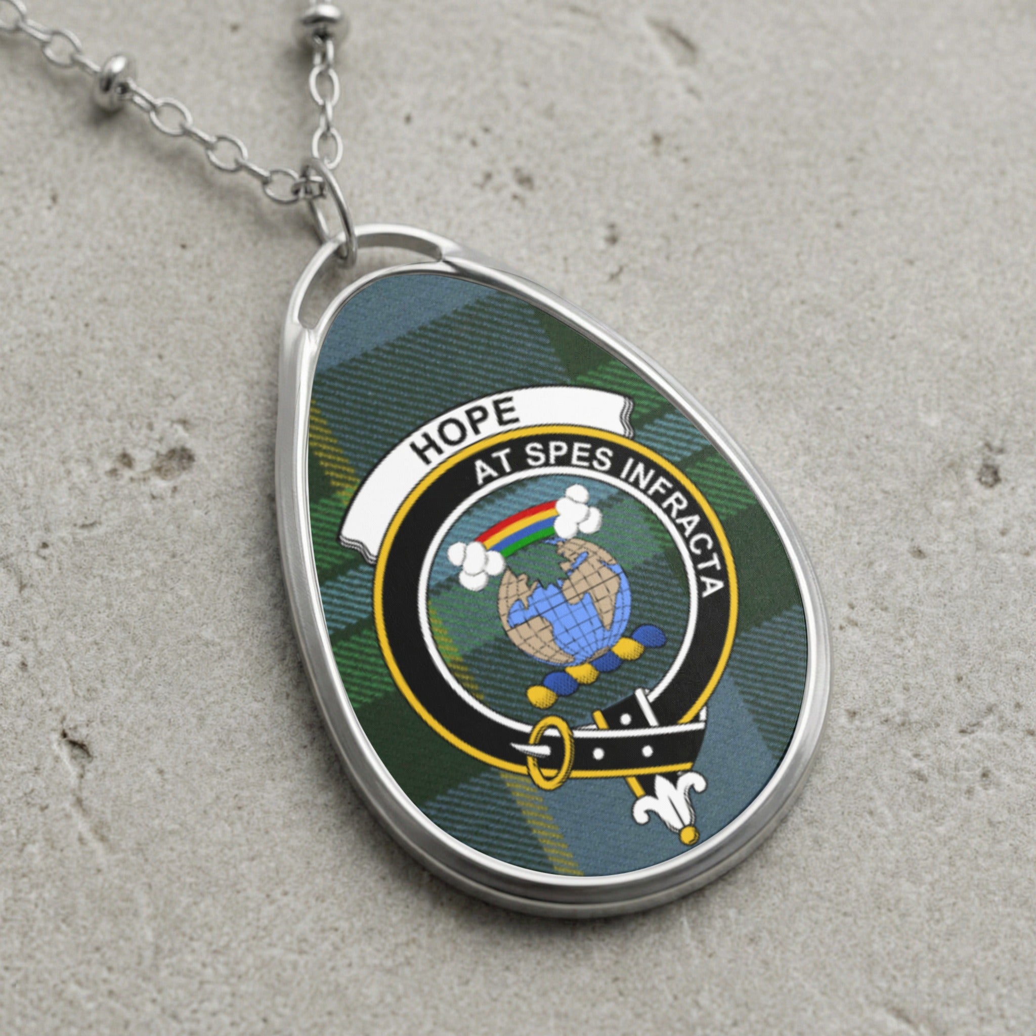 Hope clan Scottish tartan necklace with clan crest and At Spes Infracta motto on tartan background