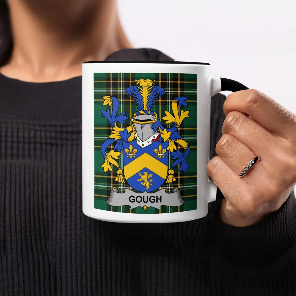 Mug with the Gough family crest on a plaid background.