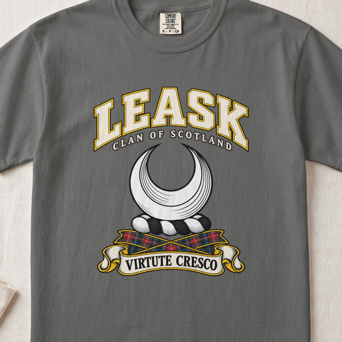 Leask Scottish clan T-shirt in Pepper, front view with a silver crescent and motto design.