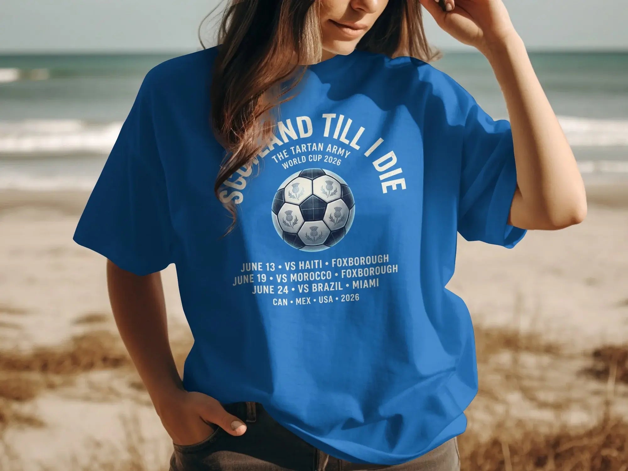 Blue t-shirt with "Scotland Till I Die" and World Cup 2026 schedule.
