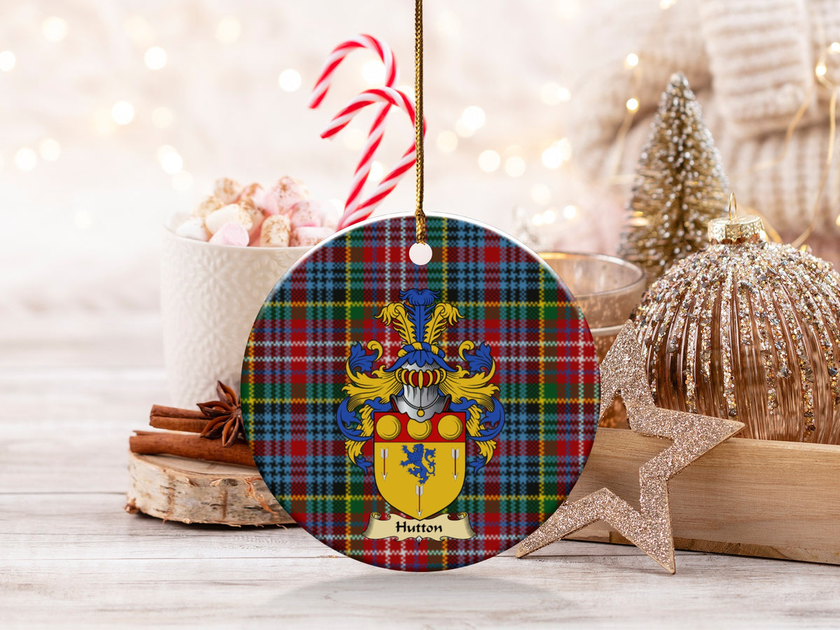 Double-sided Hutton ceramic ornament with family shield and Caledonia tartan background