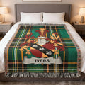 Tartan blanket featuring the Ivers family crest with a shield and banner.
